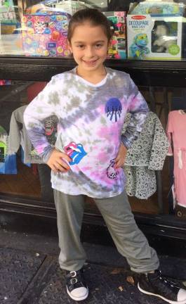 applying fun Kids can celebrate birthdays while decorating clothes with all sorts of designs at Appliké Couture on East 75th Street. Photo: Courtesy of Appliké Couture