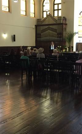 words of wisdom The Rev. Beverly Dempsey during Easter Service at Jan Hus Prebyterian Church. Photo courtesy of Jan Hus Prebyterian Church
