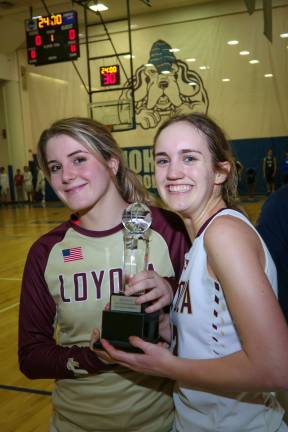 Sweet Victory Co-captains Summer O’Sullivan and Tori-May Della Pace (right) of Loyola School celebrate their NYCAL championship victory over Columbia Prep last month. Photo: Mark Wyville