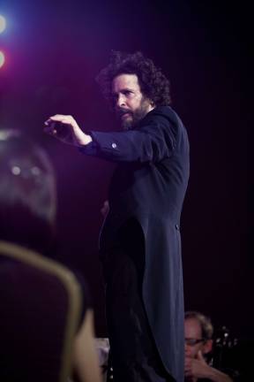 The gift of sound and vision Gregory Singer conducting the Manhattan Symphonie. Photo: David Usui.