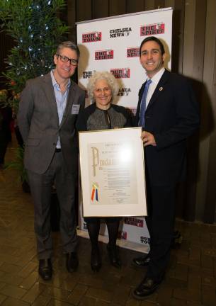 45 years and counting event honors our town, east side businesses From left, Our Town Editor in Chief Kyle Pope, Straus News President Jeanne Straus, and Councilmember Ben Kallos, with a proclamation honoring the newspaper and the businesses being celebrated