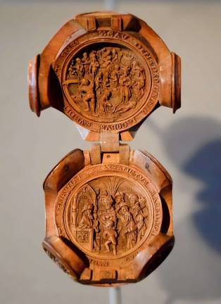 infinity, in the palm of your hand A prayer bead depicting the Legend of Saint James the Greater made in the Netherlands in the 16th century is just 2-1/4 × 1-7/8 inches in diameter. Photo: Adel Gorgy