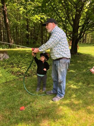 Michael Zisser with grandson Caleb, and his version of retirement.&#xa0;Photo: Emma Bloch