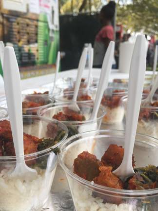 Dishing it out at the vendys Sample-sized portions of white rice and buka sauce, one of DF Nigerian's signature dishes. Photo: Carson Kessler