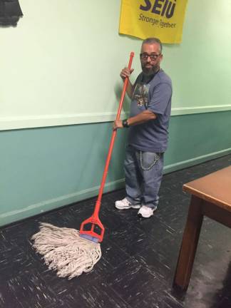 Last one on the dance floor Ralph Archer, a janitor at Henry Hudson Junior High School. Photo: Annie Nova