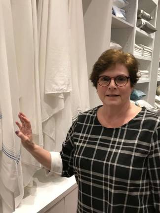 STILL GRACIOUS, BUT ALSO FUNKY AND HIP Esther Eaton, CEO of Gracious Home, at the SoHo store. Photo courtesy of Gracious Home
