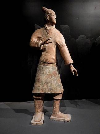 ancient china unearthed This standing terracotta figure, portraying an actual soldier from 2200 years ago, is one of thousands found in Emperor Shi Huang's burial pit. Photo: Adel Gorgy
