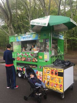 In Riverside Park, a Taste of Ecuador awaits visitors near recreational facilities. Photo: Christopher Moore