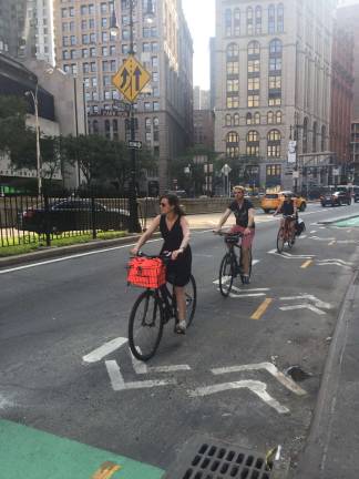 Safety improvements planned for Park Row Cyclists along Park Row, which is scheduled for bicycle and pedestrian safety improvements. Photo: Carson Kessler