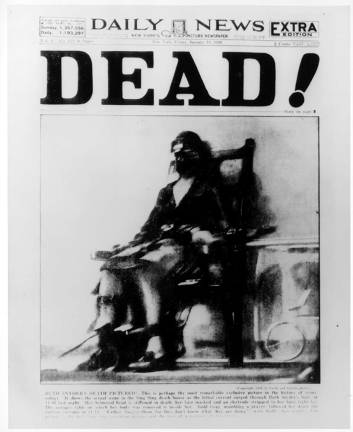 ‘TOO TOUGH TO DIE’ This famed and controversial Page One photo ran in the Daily News on January 13, 1928 under a single stark word – “DEAD!” – after a photographer using a hidden ankle camera shot a photo of the murderess Ruth Snyder at the moment she was electrocuted at Sing Sing Prison. The photo triggered a debate about capital punishment that continues to this day. Photo:Tom Howard, Daily News photographer, via Wikimedia Commons