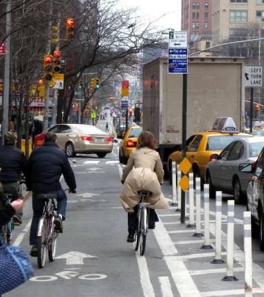 DISRUPTING THE GRID Cyclists heading southbound on Ninth Avenue near West 30th Street. Photo via Wikimedia Commons