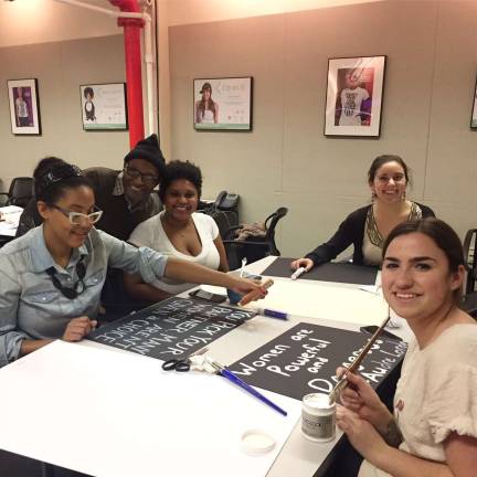 Ready for the Women's March Crafting signs at Planned Parenthood's Margaret Sanger Health Center on Bleecker Street for this week's Women's March on NYC. Photo: Carrie Mumah / Planned Parenthood 