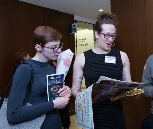 honoring east siders Zil Goldstein (right) reads her OTTY profile in Our Town. Photo: George Cade Photography