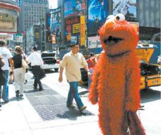 Ticket me Elmo? City mulls law for impersonators