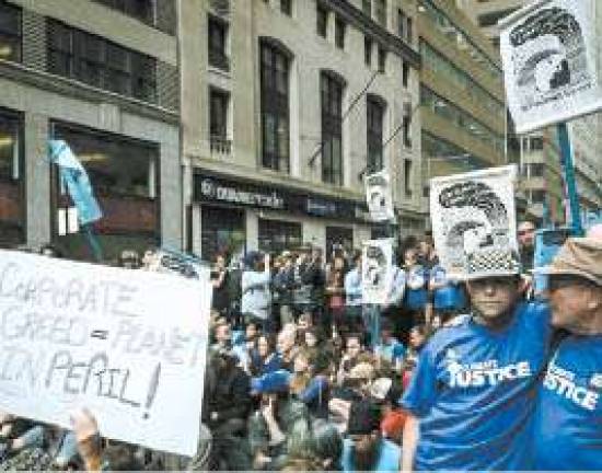 Protestors Flood Wall Street