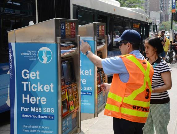 Zipping across 79th street? Passengers pay at kiosks before boarding the SBS. Photo: Marc A. Hermann / MTA New York City Transit, via flickr