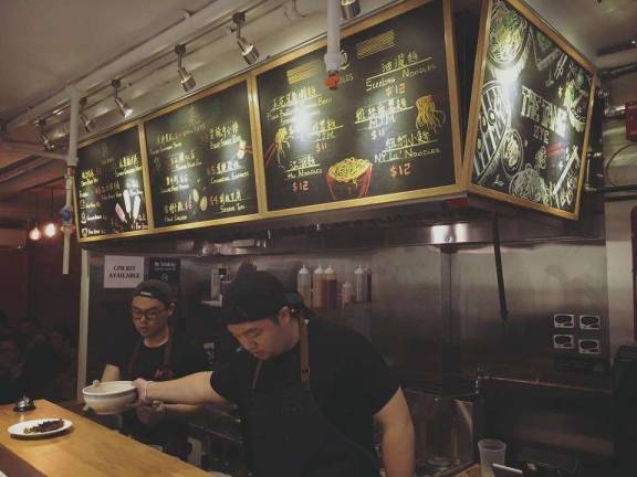 rebranding tradition Eric Sze (left), started The Tang, an East Village noodle bar. A generation of Chinese-American cooks are expanding Chinese cuisine's parameters, he said. Photo: Claire Wang