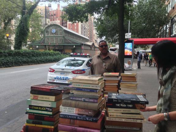 Throwing the Book at a Broadway fixture News Kirk Davidson talking with a potential customer. Photo: Richard Khavkine