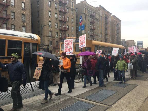 “Which side are you on?” Protestors picketed outside state Senator Marisol Alcantara's office in Washington Heights last week. Photo: Madeleine Thompson  