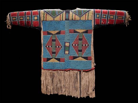Whole Worlds in Everyday Objects Boy's shirt, unrecorded Apsaalooke (Crow) artist, 1870–1900, Montana. Photo: Adel Gorgy