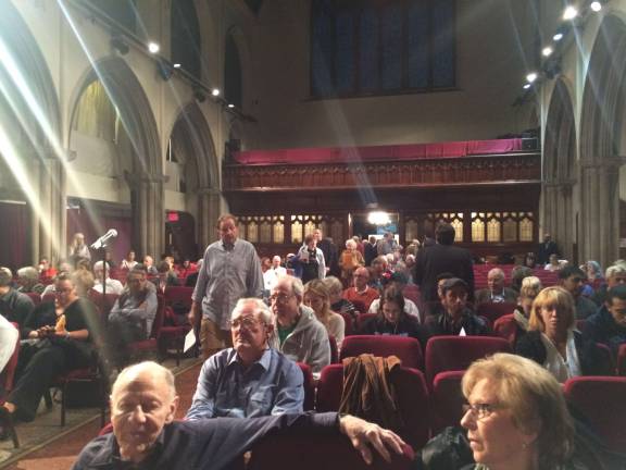 As a museum expands, neighbors Grope for answers News The crowd filing in for the community meeting on the American Museum of Natural History's expansion plans. Photo by Gabrielle Alfiero