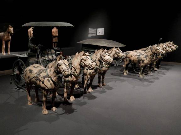 ancient china unearthed Half-sized horses and charioteers precede life-sized warriors excavated from Xian, China, and give a glimpse at one of the most important archeological finds of the century. Photo: Adel Gorgy