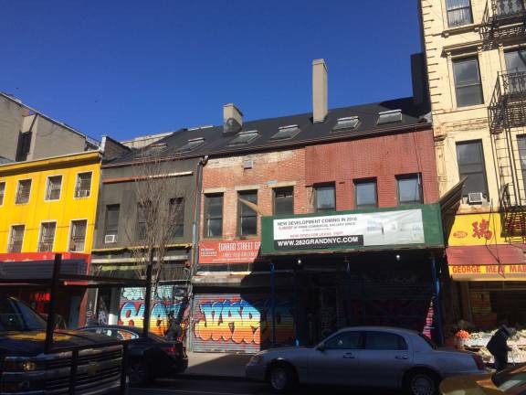 Is chinatown the city's new arts district? Gallerist Marc Straus plans on demolishing this row of Federal-era buildings on Grand Street near Allen Street in Chinatown in favor of an 8-story condo and gallery development. Photo: Lily Haight