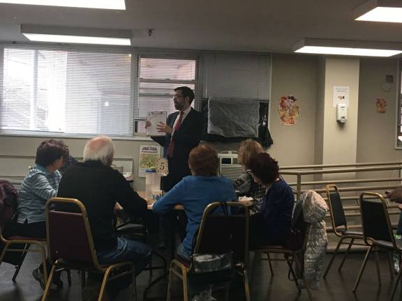 Senior centers could face cuts State Senator Daniel Squadron at Independence Plaza North Senior Center in lower Manhattan last week, where he gathered signatures for his petition opposing funding cuts to senior programs. Photo: Madeleine Thompson