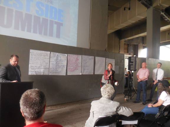 Johnson outlines state of district Councilman Corey Johnson, left, listens as constituents talk about needs and wants for the district during Johnson's "West Side Summit" on the High Line May 14. Photo: Crystal Wolfe