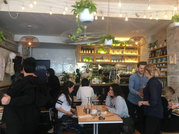 little australia’s uncertain future Two Hands Café on Mott Street, which replicates Australia's beachside vibe. Photo: Mihika Agarwal