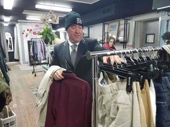 Longtime customer Rommel Cintron in the 79th Street store. Photo: Jason Cohen