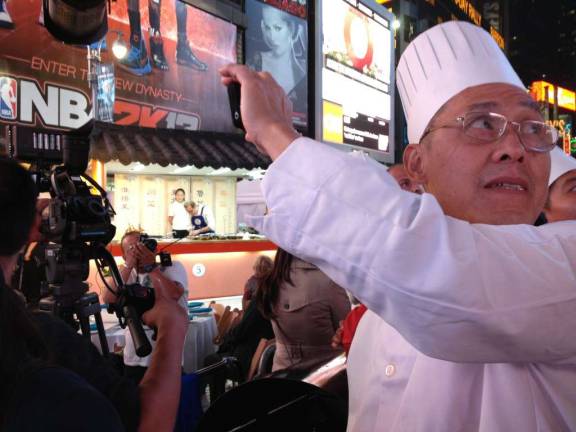 Fire Up The Wok Challenge Fills Times Square with Aromas of Kung Pao Chicken & Gong Music