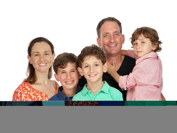An endurance test for Arts in city schools Joanna and Michael Droege, pictured with their sons Logan, now 13; Holden, 11, and Jack, 6, are in India to participate in a rickshaw race through which they hope to raise funds for arts programming in city schools. Photo: Peter Hurley, peterhurley.com