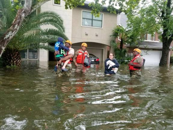 Hurricane harvey: how new yorkers can help Texas National Guard soldiers arrive in Houston, Texas to aid citizens in heavily flooded areas from the storms of Hurricane Harvey. Photo: Lt. Zachary West , 100th MPAD, via flickr