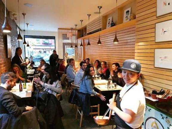 rebranding tradition Simone Tong, right, owner and chef of the East Village Yunnanese noodle bar, Little Tong, notes the lack of diversity of Chinese cuisines in the city. Photo: Claire Wang
