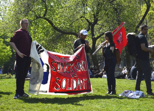 NYU Sanctuary’s May Day walkout New York University students prepared for a rally and walk from Washington Square Park to Union Square following a May Day teach-out. Photo: Diamond Naga Siu