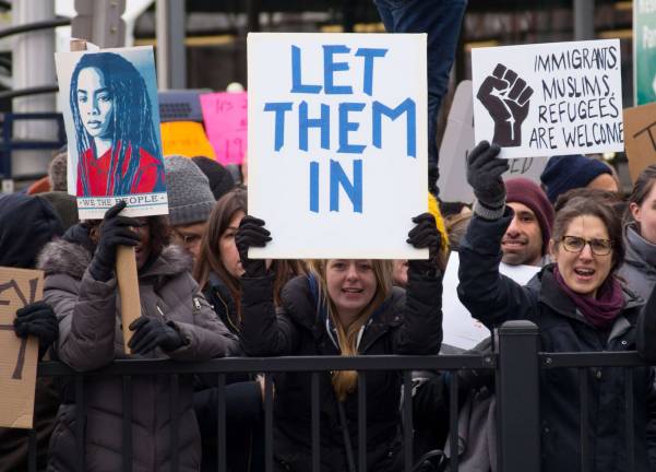 Religious leaders react to travel ban Hundreds descended on John F. Kennedy International Airport’s Terminal 4 Saturday to protest President Trump's executive order banning citizens of seven countries from traveling to the United States. Photo: Rhododendrites, via Wikimedia Commons
