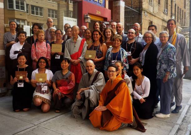 GOOD KARMA ON 64TH STREET The 75-year-old Zen Buddhist monk Samu Sunim (at center, with red sash over gray robes) surrounded by about 30 members and followers in front of his Zen Buddhist Temple at 206 East 63rd Street. Photo: Zen Buddhist Temple, via flickr 
