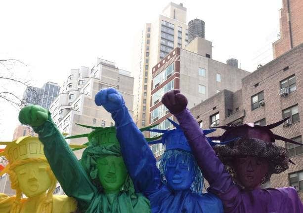 Marching Millennials Statues of Liberty at the Women's March on New York City on Jan. 21. Photo: Alicia Alonso