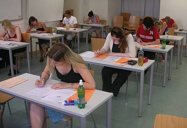 Starting College, Escaping the College Board Students taking a test. Photo: Kurt Forstner via Wikimedia Commons