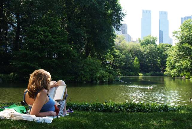 How to read in the city A reader in Central Park. Photo: Kristin Wall, via flickr