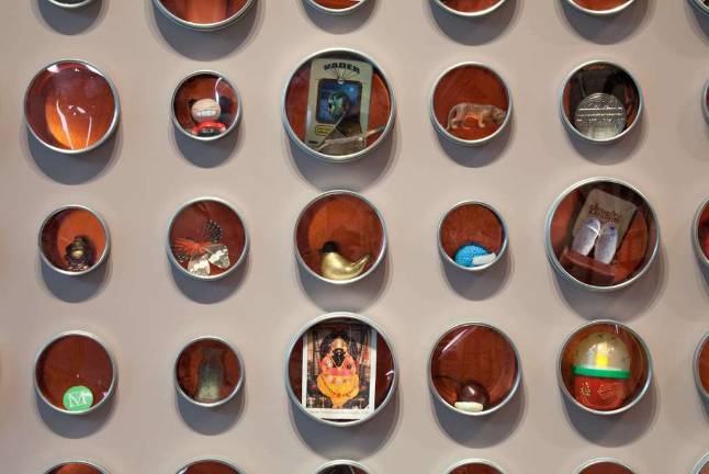 Altering the self and the world Some of the hundreds of gifts brought to the museum by patrons in exchange for small psychic cross pendants. Photo: David De Armas