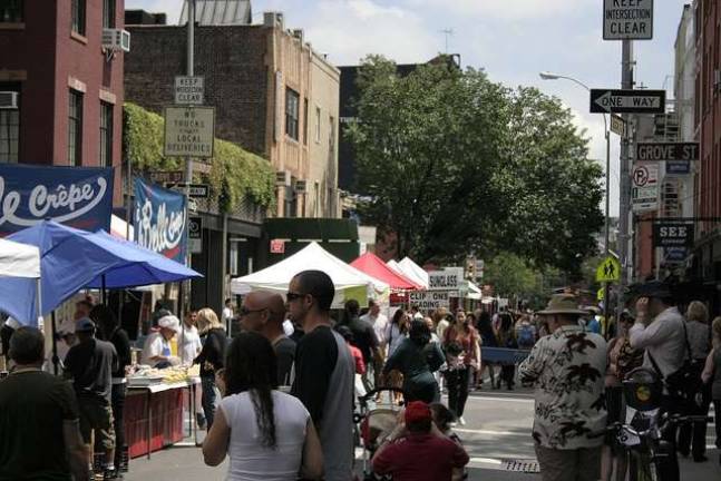 City proposes street fair changes A Manhattan street fair. Photo: Paul VanDerWerf via Flickr