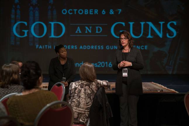 faith leaders address guns The Rev. Dr. Lisa Thompson, a professor a Union Theological seminary, left, and the Rev. Amy Butler, senior minister at Riverside Church, during a plenary session on gun violence at Riverside Church Oct. 7. Photo: Helena Kincaid
