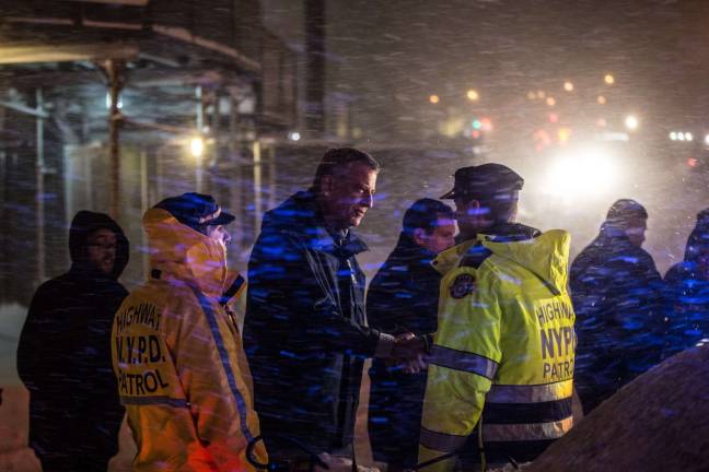 CAPTURING the mayor Mayor Bill de Blasio visits NYPD Highway Patrol Officers at a checkpoint on on West Side during the blizzard Jan. 23, 2016. The officers were enforcing a travel ban declared by the mayor earlier in the day. Photo: Michael Appleton/Mayoral Photography Office