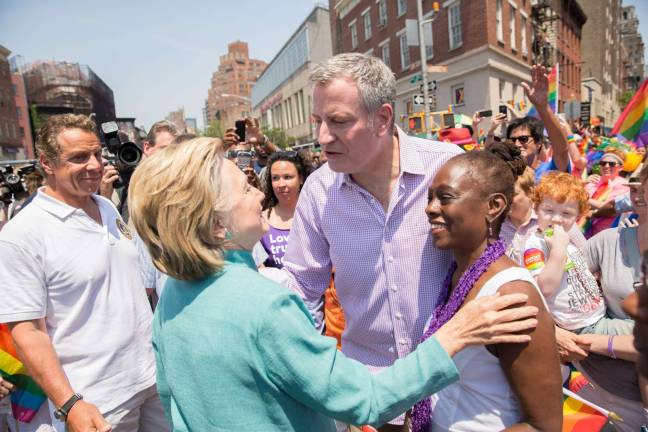 not so fast with the bubbly Mayor Bill de Blasio and First Lady Chirlane McCray at New York City's LGBT Pride March in June 2016 with Gov. Cuomo (left) and Hillary Clinton. Photo: Michael Appleton/Mayoral Photography Office