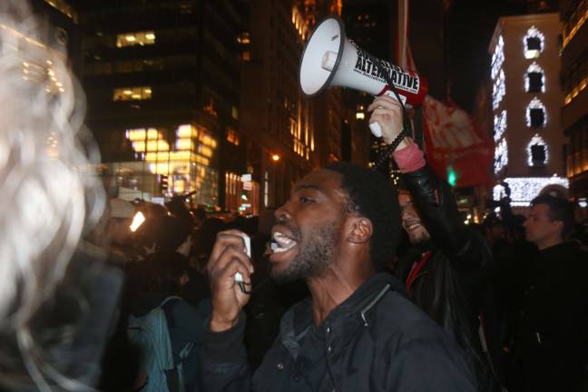 Thousands protest Trump’s triumph Thousands marched in city streets Wednesday night to express their displeasure and frustration at election results. Photo: Micah Danney