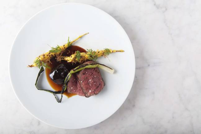 Best of manhattan 2016 Dovetail beef filet. The beef filet and braised cheek at Dovetail, complete with carrot, crème fraiche and scallion