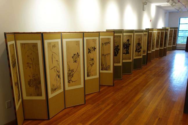 GOOD KARMA ON 64TH STREET A private fourth-floor art gallery space at the Zen Buddhist Temple on East 63rd Street displays dozens of painted, embroidered, accordion-style folding screens that portray scenes in nature or tell stories with handwritten Korean characters. It will eventually be used to host public art shows, though there are no immediate plans. Photo: Ben Henry / Zen Buddhist Temple