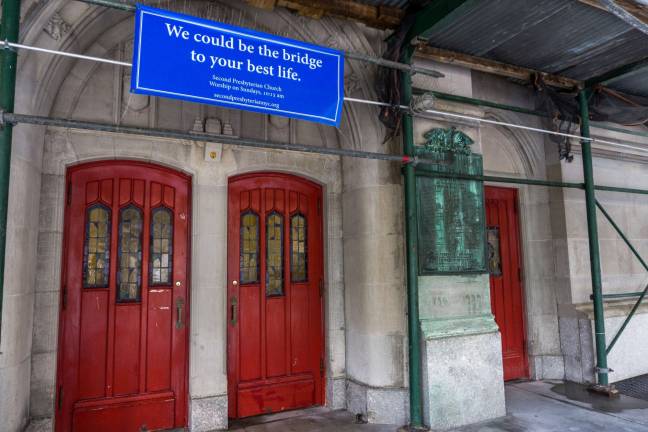makeover for a west side building The Church's entrance on 96th street is still covered by scaffolding that is expected to come down within a few weeks. The scaffolding has been up for over a decade. Photo: Sophie Herbut